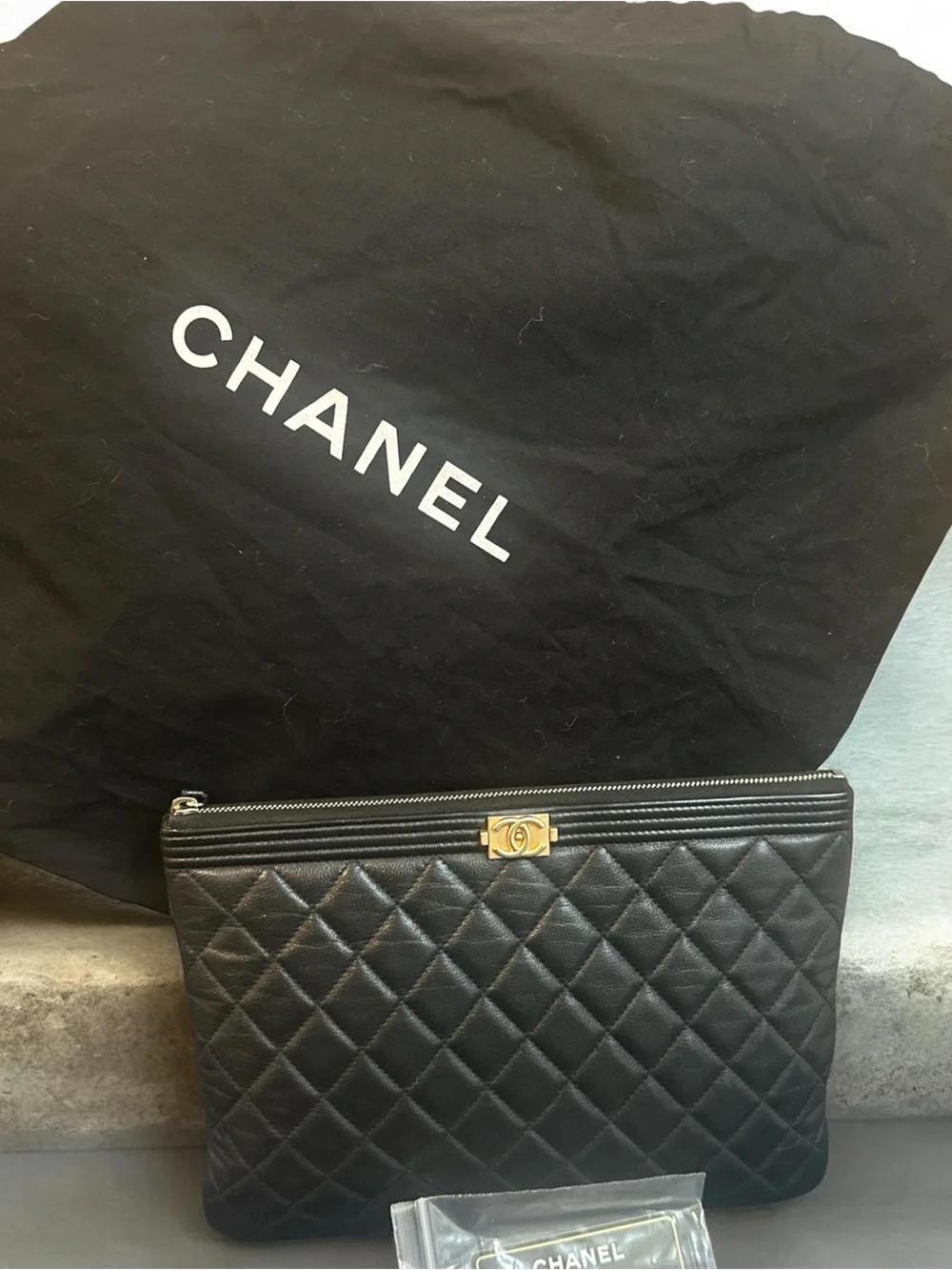 CHANEL Black Quilted Leather Boy-O Case Clutch with Gold CC Accent